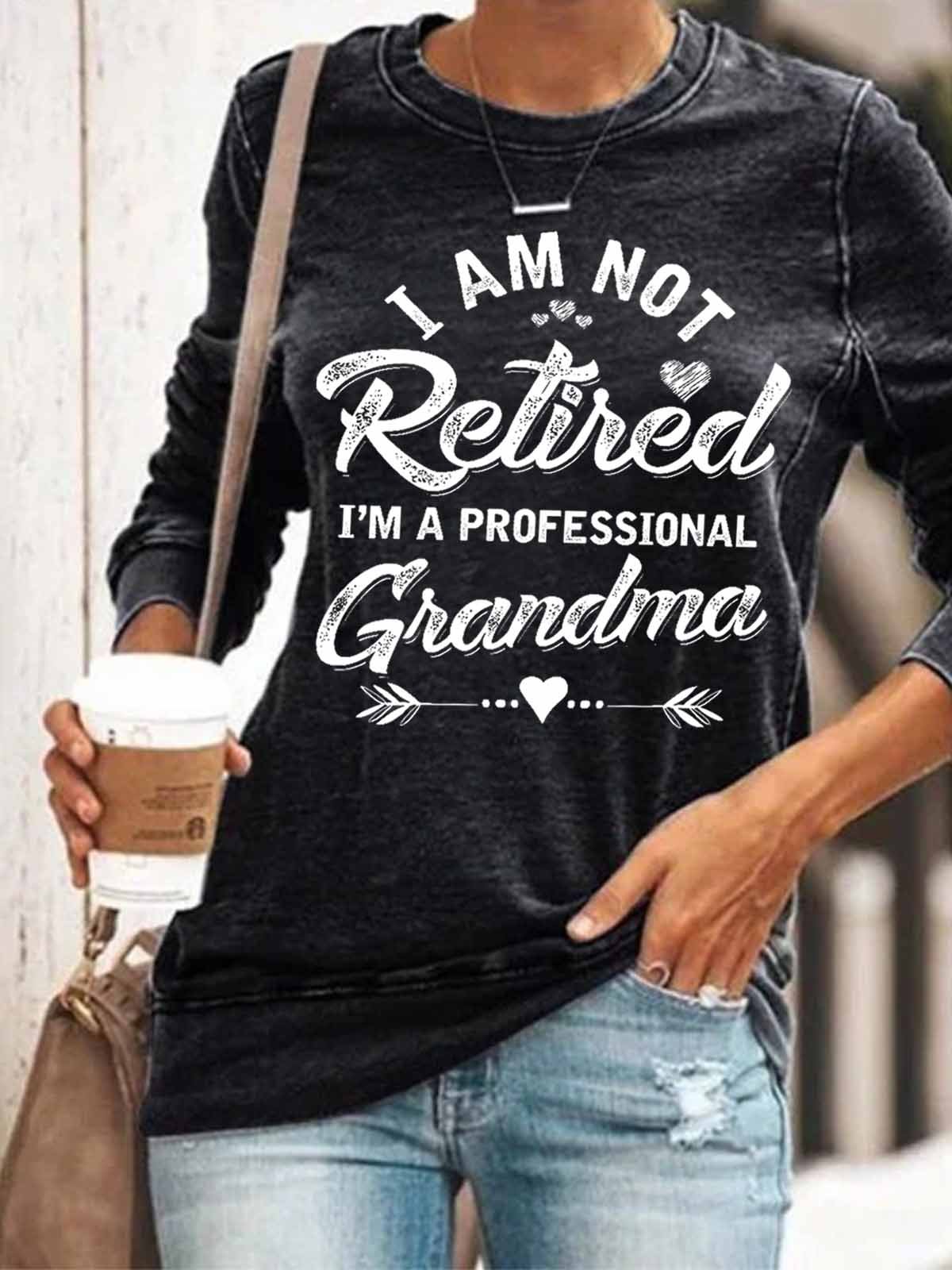 Women's Funny Text Letters I Am Not Retired I Am A Professional Grandma Crew Neck Sweatshirt