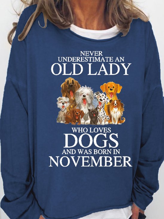 Never Underestimate An Old Lady Who Loves Dogs And Was Born In November Women's Sweatshirts
