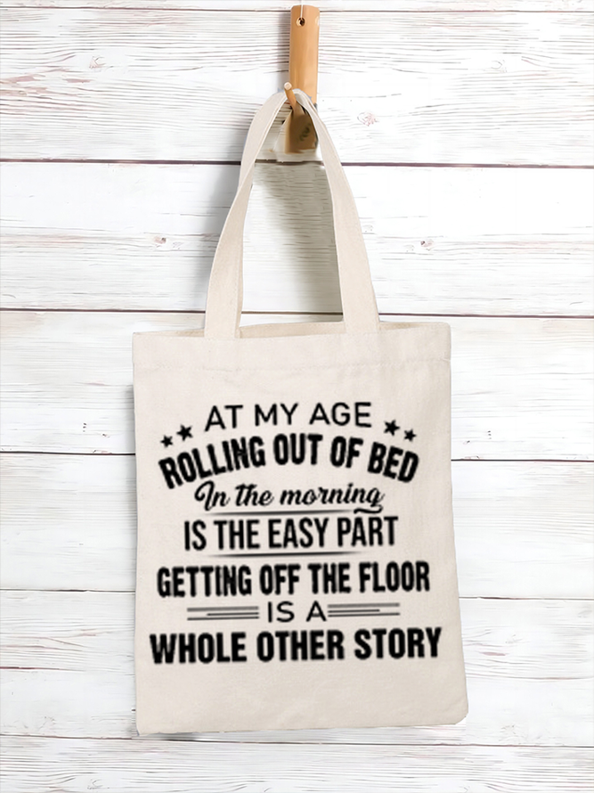 Women's Sarcasm At My Age Rolling Out Of Bed In The Morning Is The Easy Part Getting Off The Floor Is A Whole Other Story  Shopping Tote